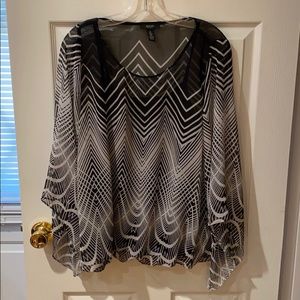 Sheer top with attached camisole